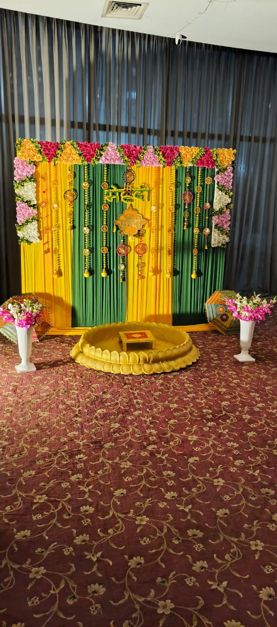 Luxurious Indoor Haldi Stage with Golden Lotus Seating Tub