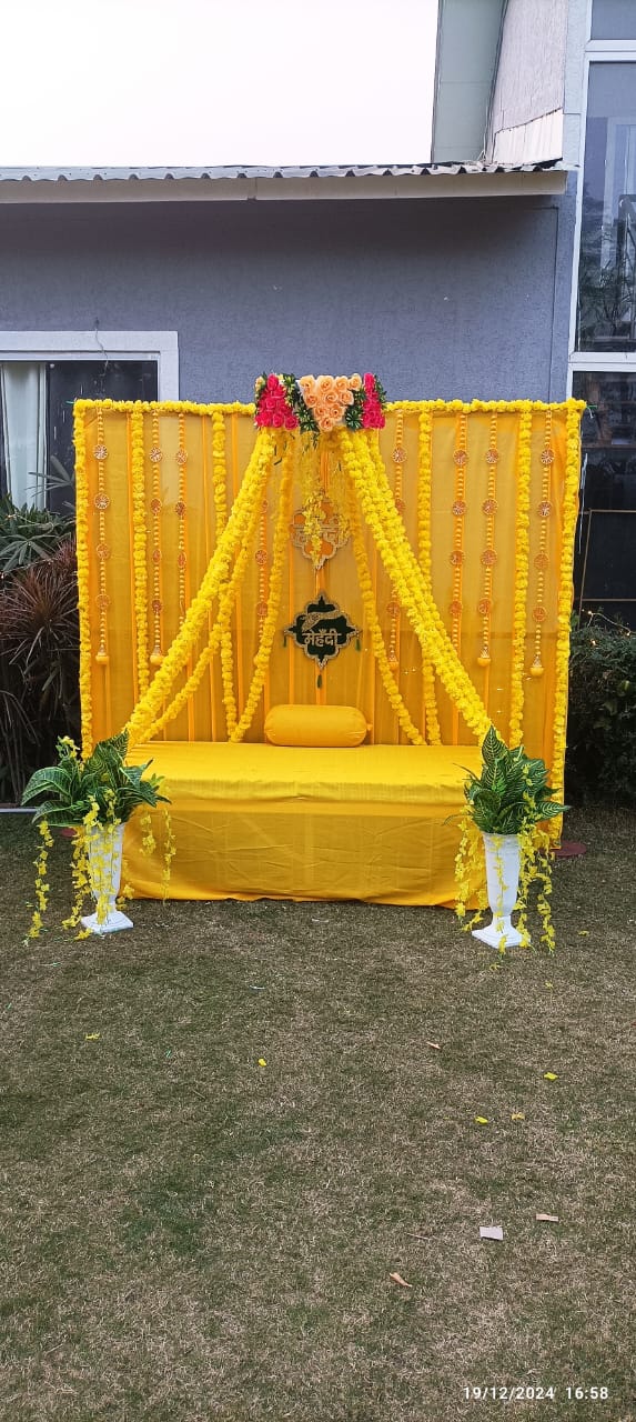 Outdoor Haldi/Mehendi Seating Canopy Backdrop with 'Mehendi' Sign
